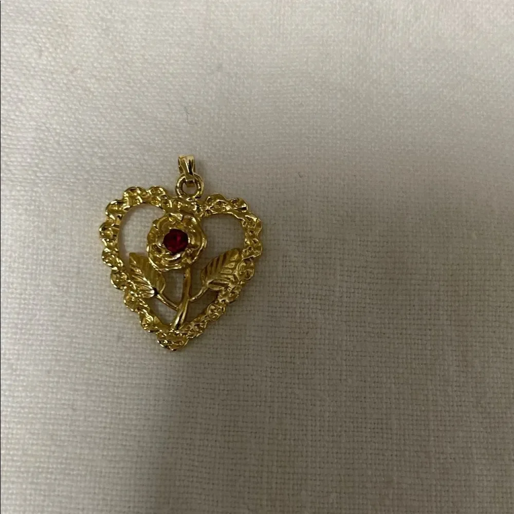 Gold Tone Heart Pendant with Red Gemstone